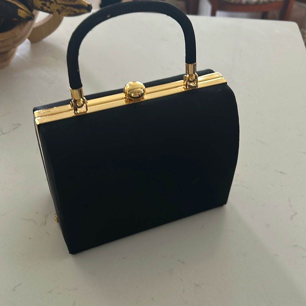 Vintage Lord and Taylor, satin and gold mini bag
.